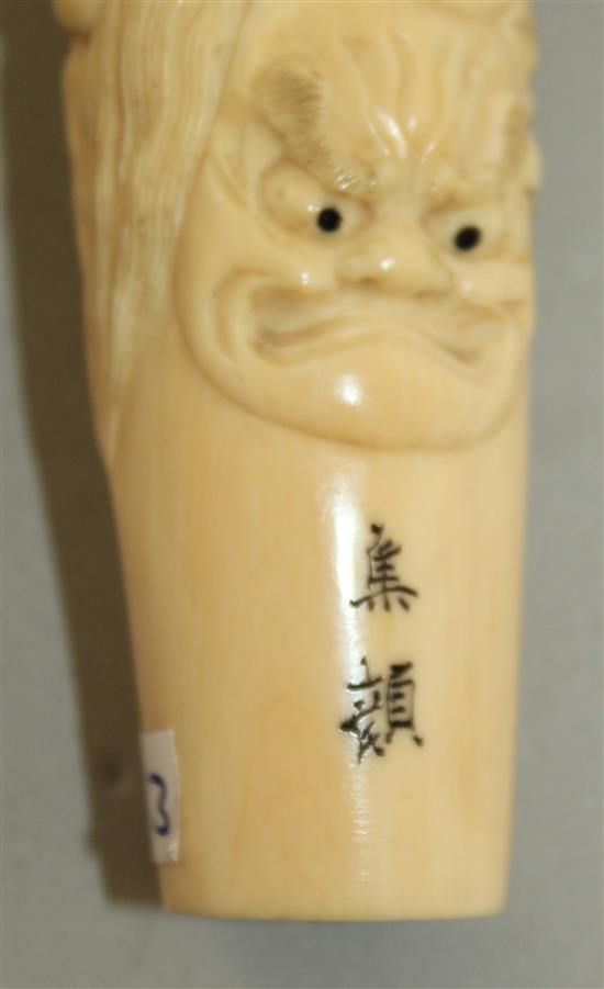 A Japanese ivory cane or parasol handle, early 20th century, 14.2cm